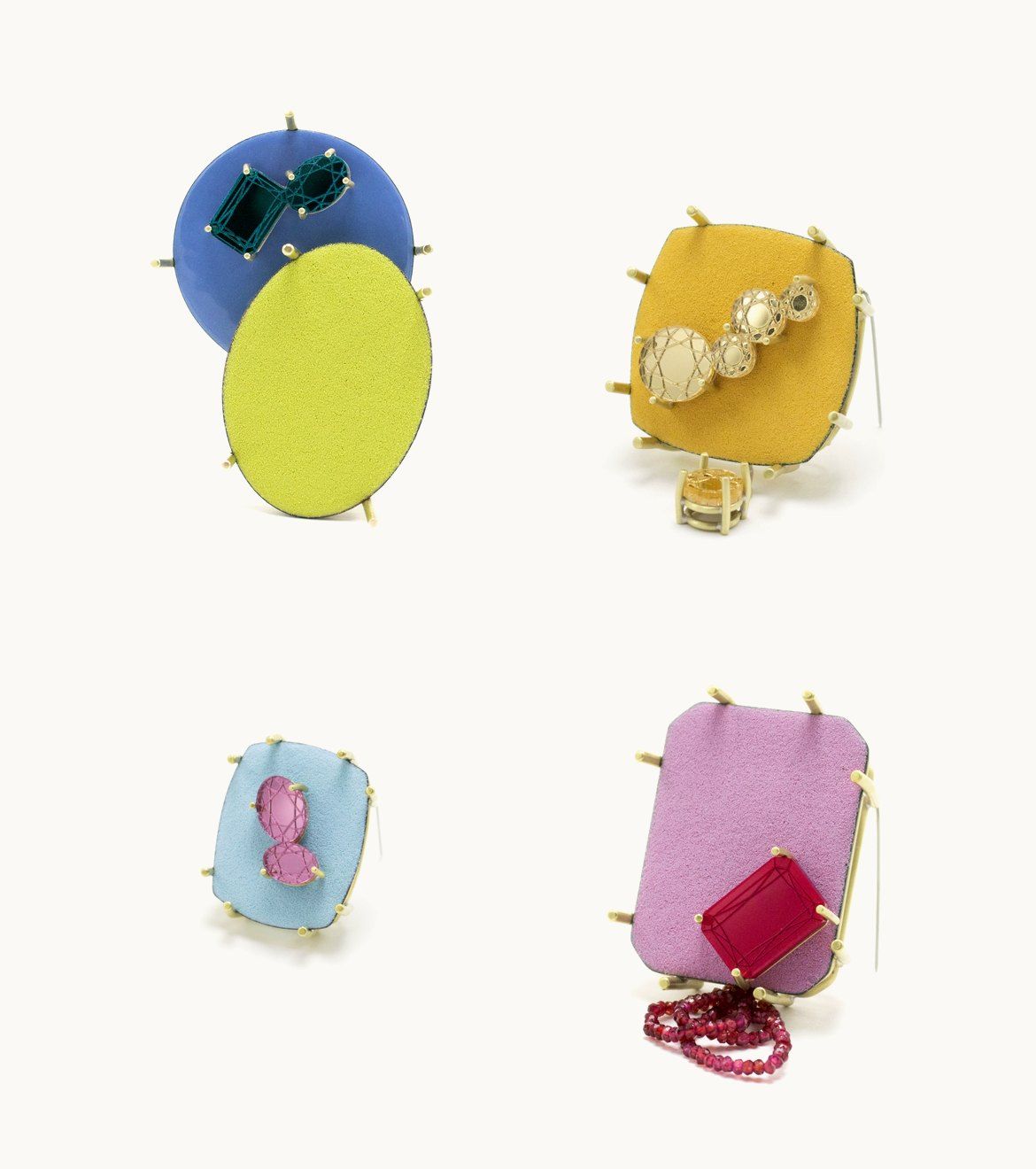 Four enamel brooches from The quiet practice of becoming, in blue and yellow, mustard, pale blue and lilac, set with faceted acrylic stones
