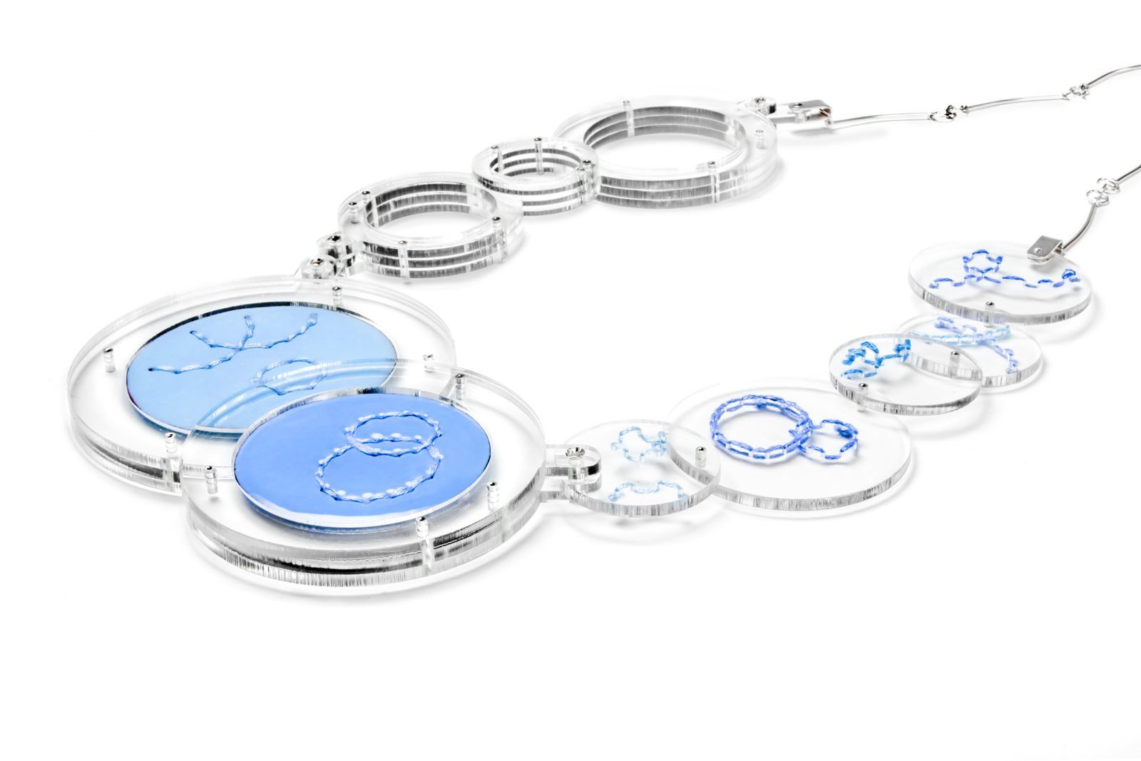 Necklace with large blue enamel discs and silver rings