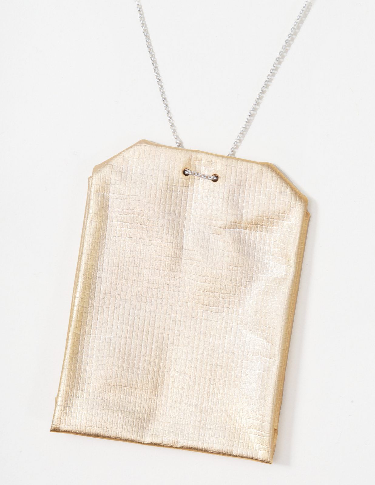 Gold-plated tea-bag shaped pendant on a fine chain