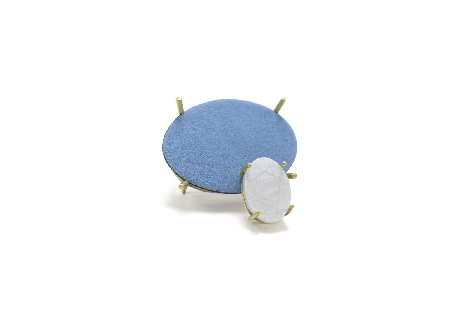 Large blue oval brooch with a small pale grey oval